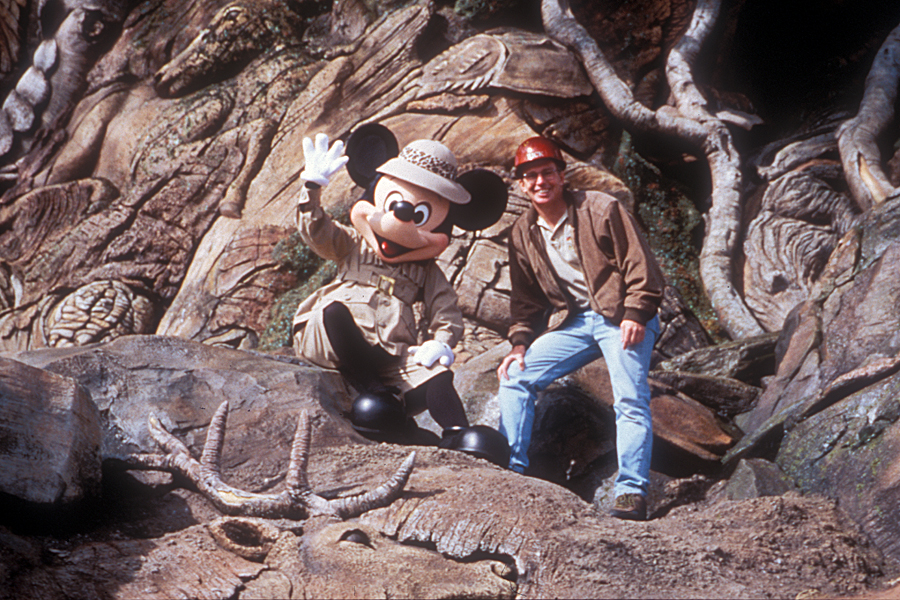 Rick Barongi and Mickey Mouse at the base of the Tree of Life at Disney's Animal Kingdom