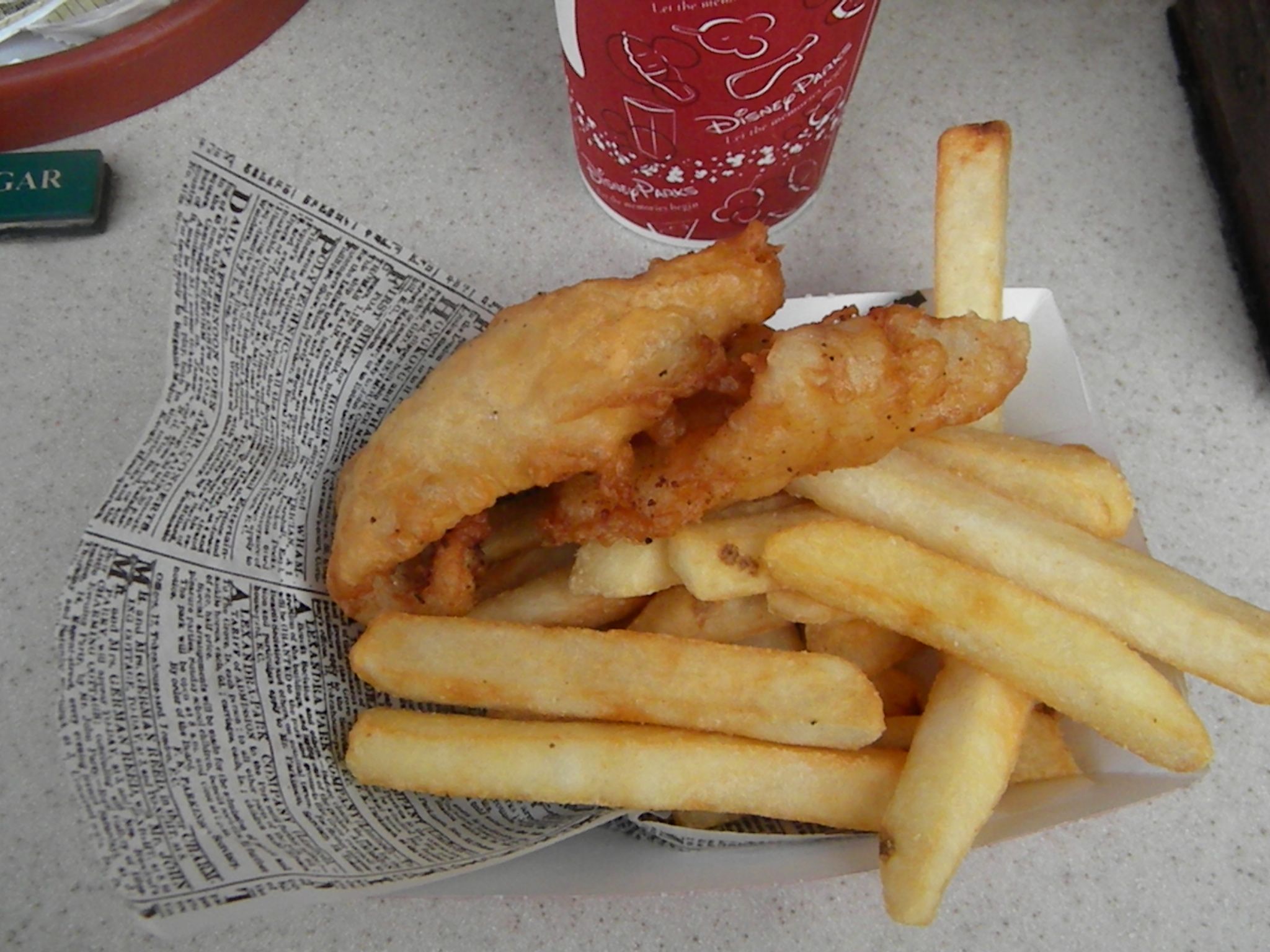 Fish & Chips, served on traditional news print. Photo by J. Jeff Kober.